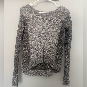 Knit sweater.